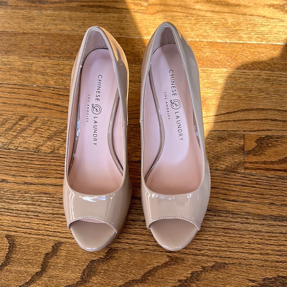 Nude peep toe stilettos size 6.5, gently used.